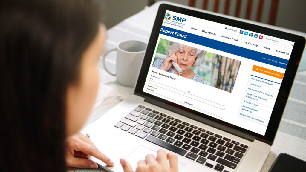 A woman accessing the Missouri SMP website on her laptop to report fraud.